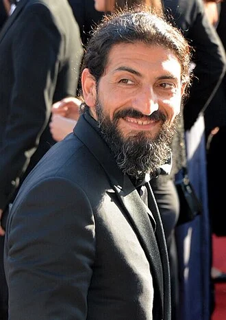 Numan Acar height profile photo