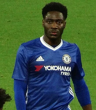 Ola Aina height profile photo