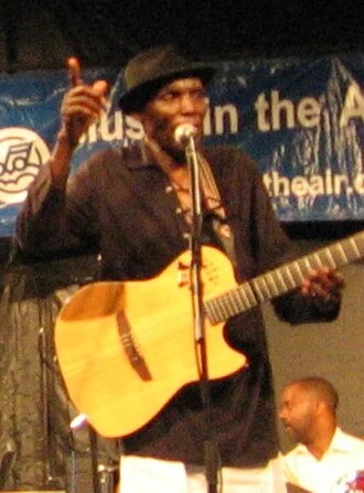 Oliver Mtukudzi height profile photo