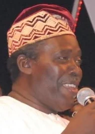 Olu Jacobs height profile photo
