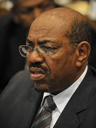 Omar al-Bashir height profile photo