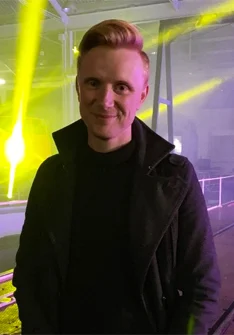 Owain Wyn Evans height profile photo