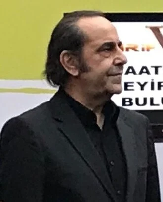 Özkan Uğur height profile photo