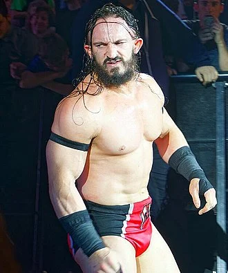Pac (wrestler) height profile photo