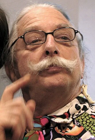 Patch Adams height profile photo