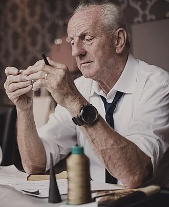 Paul Costelloe height profile photo