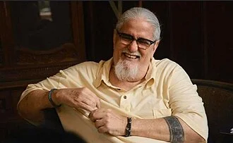 Peque Gallaga height profile photo