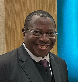 Philip Mpango height profile photo
