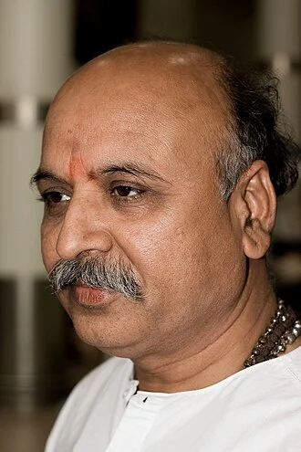 Pravin Togadia height profile photo