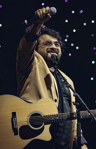 Pritam height profile photo