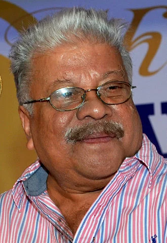 Punathil Kunjabdulla height profile photo