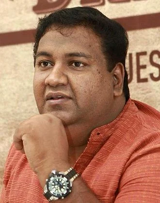 Rajesh Pillai height profile photo