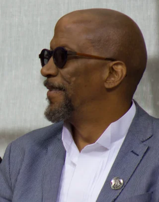 Reg E. Cathey height profile photo