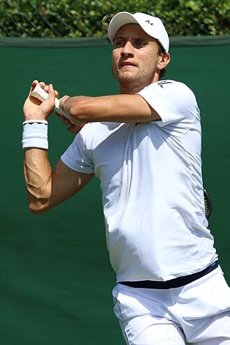 Renzo Olivo height profile photo