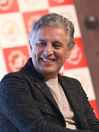 Reza Aslan height profile photo