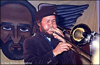 Rico Rodriguez (musician) height profile photo
