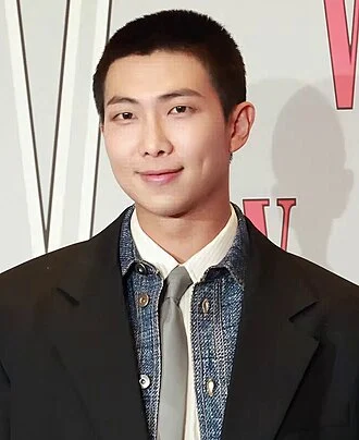 RM (musician) height profile photo