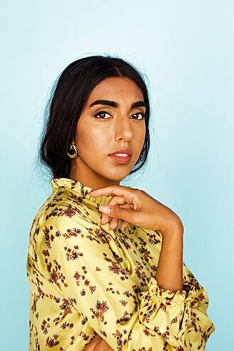 Rupi Kaur height profile photo