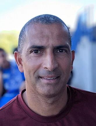 Sabri Lamouchi height profile photo