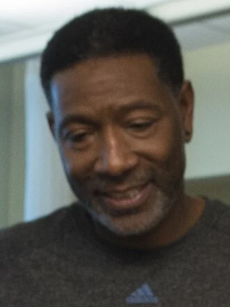 Sam Mitchell (basketball) height profile photo