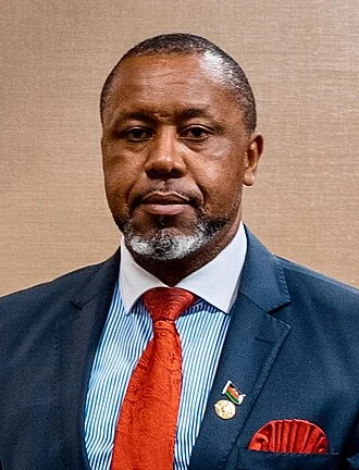 Saulos Chilima height profile photo