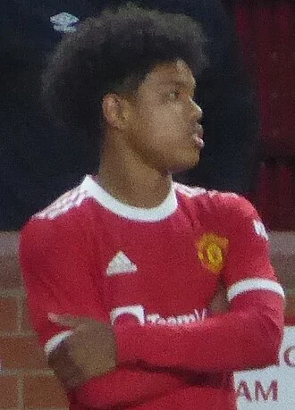 Shola Shoretire height profile photo