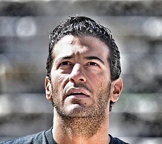 Simon Kassianides height profile photo