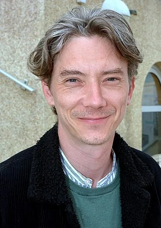 Swann Arlaud height profile photo