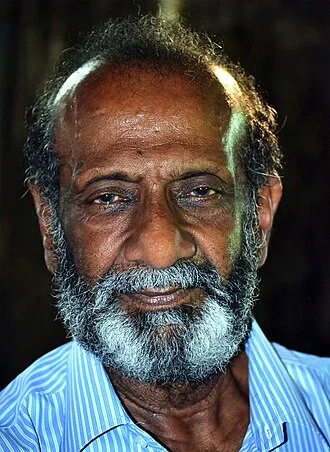 T. G. Ravi height profile photo