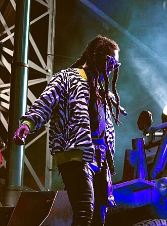Takeoff (rapper) height profile photo