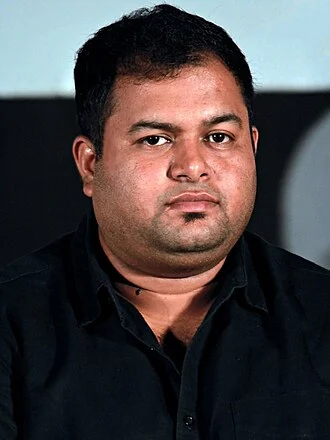 Thaman S height profile photo