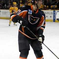 Adam Comrie height profile photo