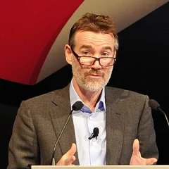 Adam Crozier height profile photo