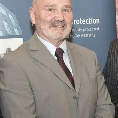Alex Maskey height profile photo