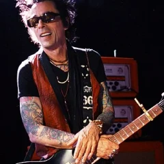 Earl Slick height profile photo