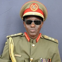 Elly Tumwine height profile photo