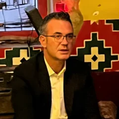 Gerti Bogdani height profile photo