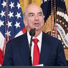 John B. Hess height profile photo