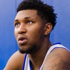 Justin Edwards (basketball, born 2003) height profile photo