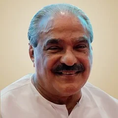 K. M. Mani height profile photo