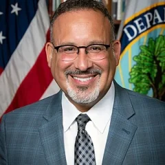 Miguel Cardona height profile photo