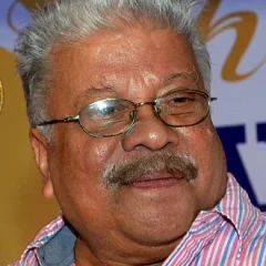 Punathil Kunjabdulla height profile photo