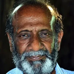 T. G. Ravi height profile photo