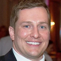 T. J. Otzelberger height profile photo