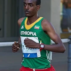 Tamirat Tola height profile photo