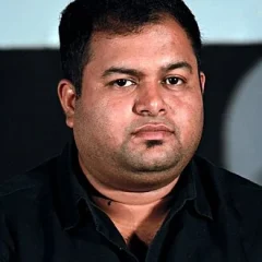 Thaman S height profile photo