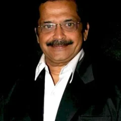 Tiku Talsania height profile photo