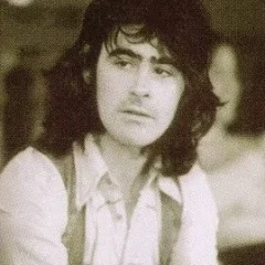 Tom Evans (musician) height profile photo