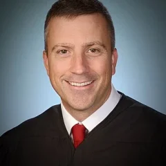 Trevor N. McFadden height profile photo