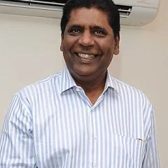 Vijay Amritraj height profile photo